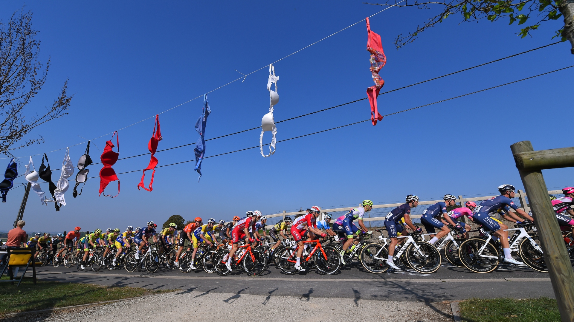 Bras hang roadside as the peloton goes by.  Belgian Road Championship 2020 from Halle to Anzegem