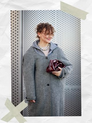 Woman wearing Burberry Rose Clutch Bag