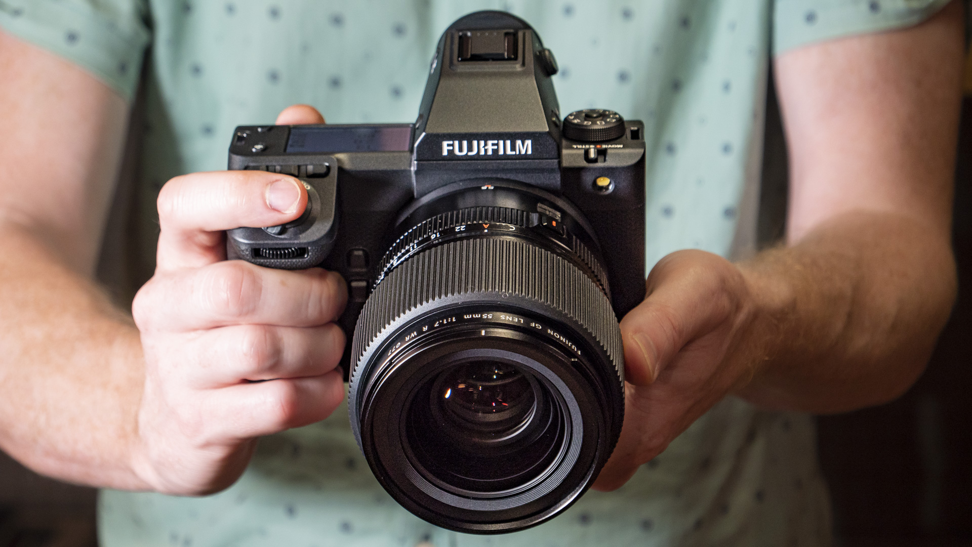 Fujifilm GFX100 II in the hand