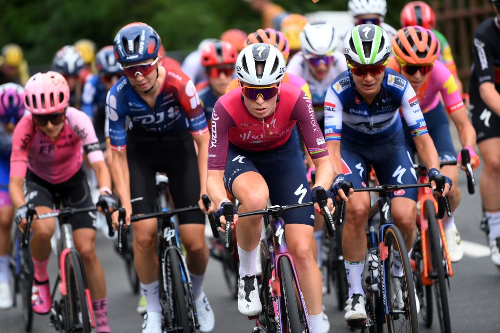 Demi Vollering at the head of the bunch with Ashleigh Moolman-Pasio