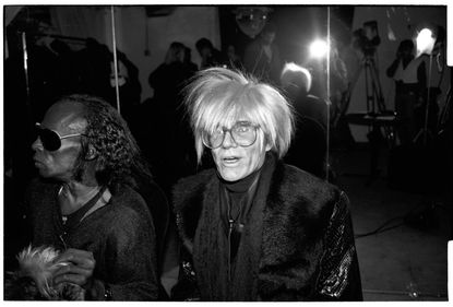 Andy Warhol pictured with Miles Davis.