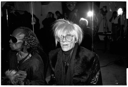 Andy Warhol pictured with Miles Davis.