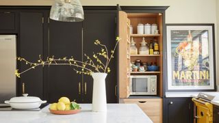 appliances stored in a cupboard