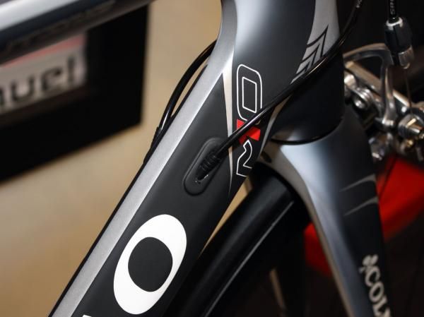 Derailleur housings plug into the frame at the down tube.