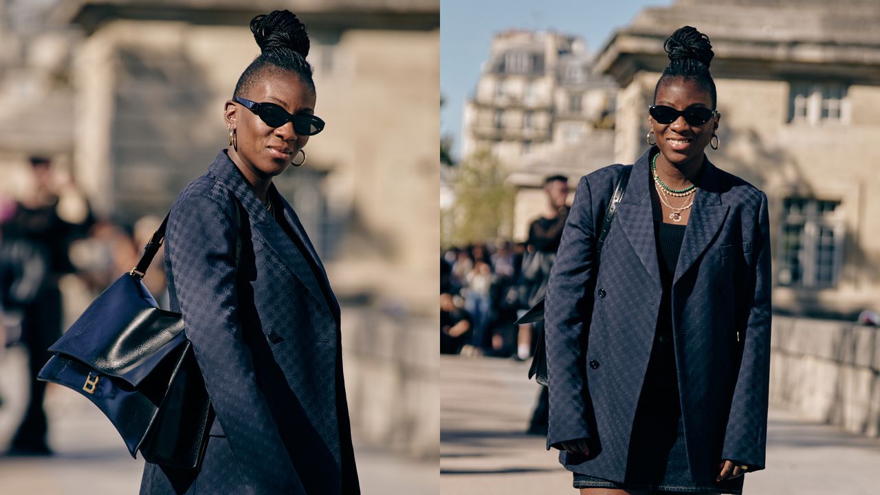 Nikki Ogunnaike wearing a navy blazer and sunglasses 