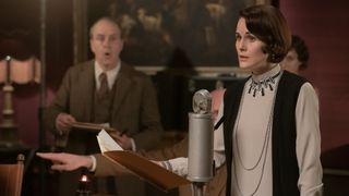 Kevin Doyle as Joseph Molesley and Michelle Dockery as Lady Mary Talbot in Downton Abbey: A New Era
