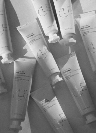 White bottles of Cle's CCC cream Korean sunscreen and skincare