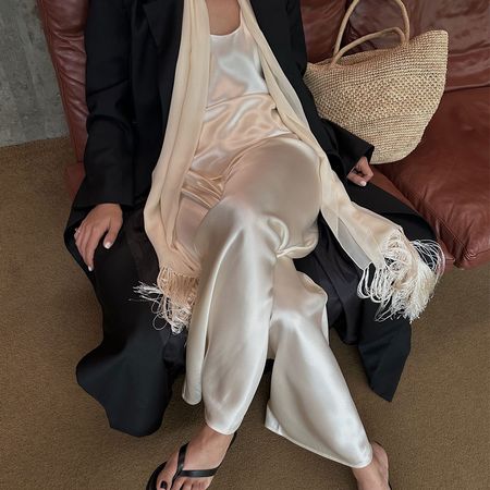 Woman in satin pants and top