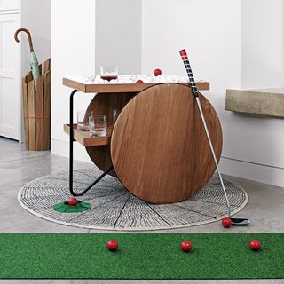 indoor golf area golf stick and golf balls