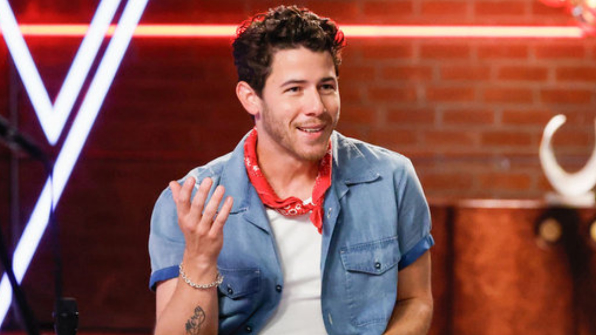 Nick Jonas is shown on The Voice.