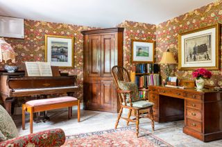 music room with piano and desk