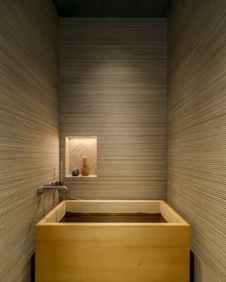 A small bathroom with a fitted bathtub