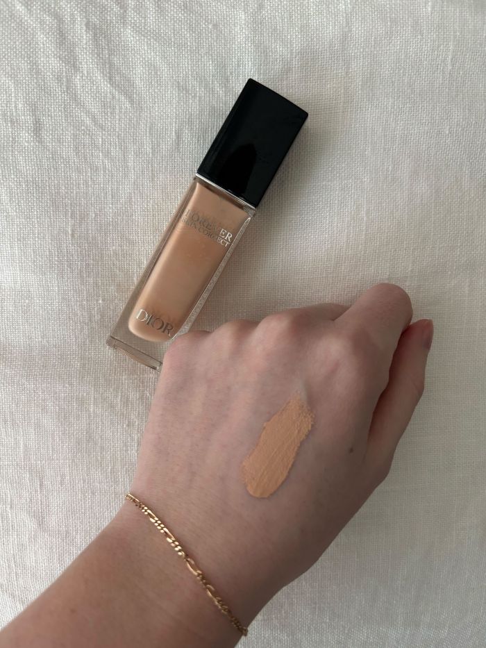 Deputy beauty editor Grace Lindsay testing a Dior concealer on the back of her hand