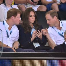Kate, William & Harry Looking at Phone