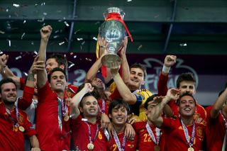 Spain players celebrate with the European Championship trophy after winning Euro 2012.