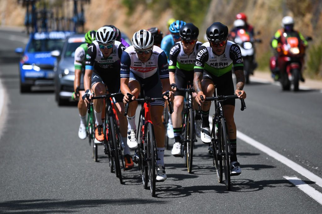ESPINOSA DE LOS MONTEROS SPAIN JULY 30 Mrton Dina of Hungary and Kometa Xstra Cycling Team Edward Theuns of Belgium and Team TrekSegafredo Roger Adria Oliveras of Spain and Team Kern Pharma Francisco Galvan Fernandez of Spain and Team Kern Pharma Breakaway during the 42nd Vuelta a Burgos 2020 Stage 3 a 150km stage from Sargentes de la Lora to Espinosa de los Monteros Picn Blanco 1486m VueltaBurgos on July 30 2020 in Espinosa de Los Monteros Spain Photo by David RamosGetty Images