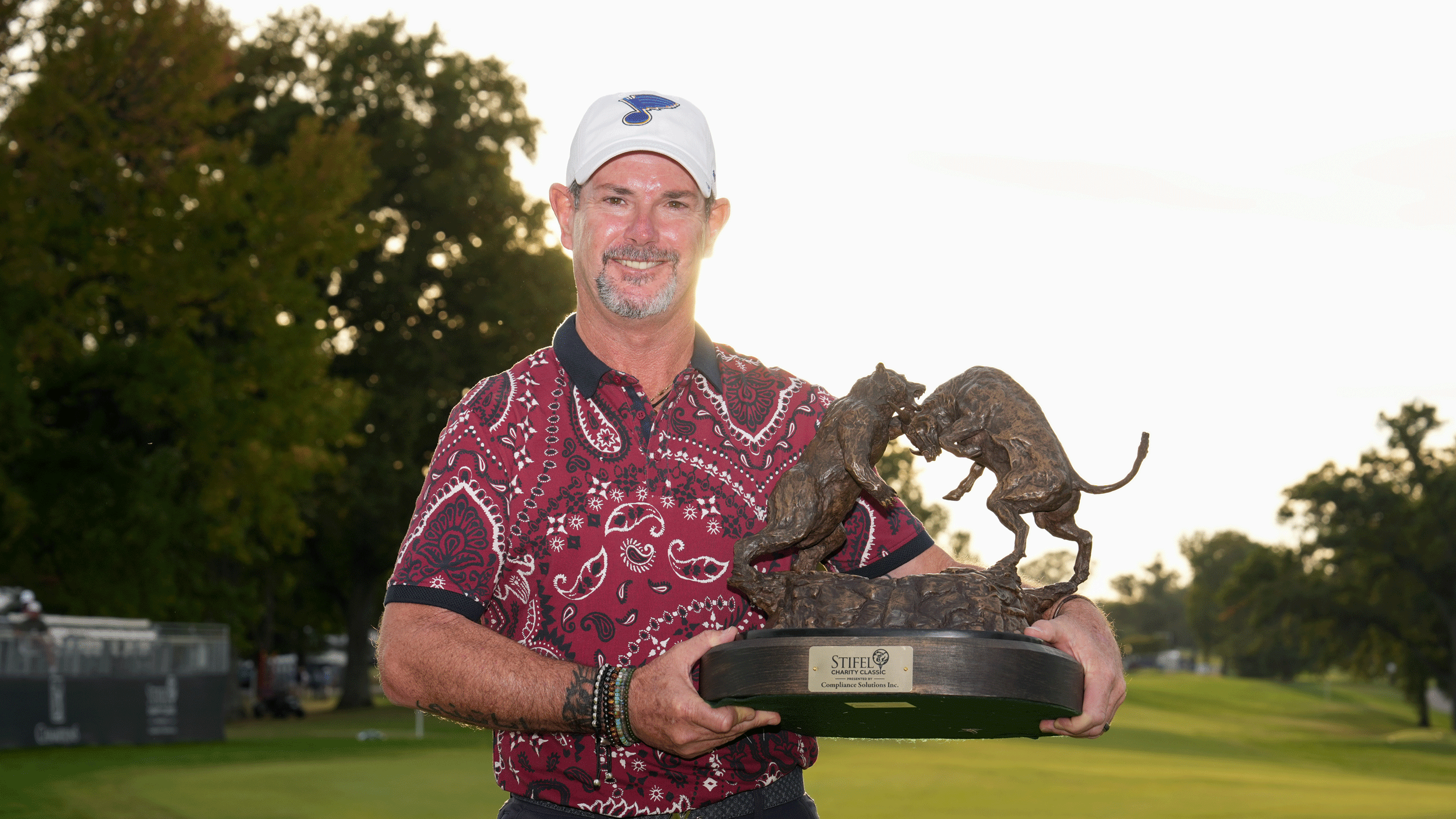 Rory Sabbatini poses with the Stifel Charity Classic trophy after winning on the PGA Tour Champions in 2026