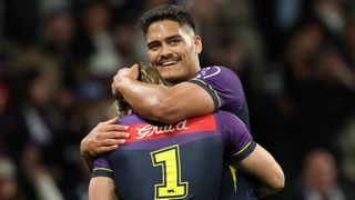 Shawn Blore and Ryan Papenhuyzen of the Storm celebrate winning the NRL Preliminary Final match between the Melbourne Storm and Cronulla Sharks at AAMI Park on September 26, 2025, in Melbourne, Australia. 