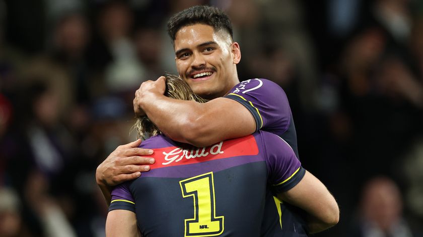 Shawn Blore and Ryan Papenhuyzen of the Storm celebrate winning the NRL Preliminary Final match between the Melbourne Storm and Cronulla Sharks at AAMI Park on September 26, 2025, in Melbourne, Australia. 