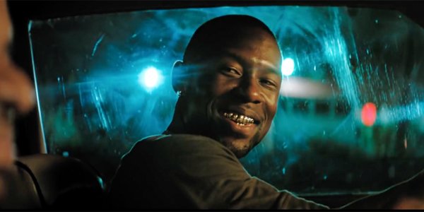 Trevante Rhodes Moonlight Smiling driving his car