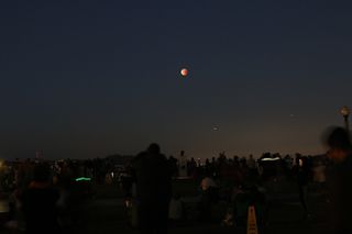 A large crowd of people gathered at the Griffith Observatory in Los Angeles to watch the total lunar eclipse of Jan. 31, 2018.