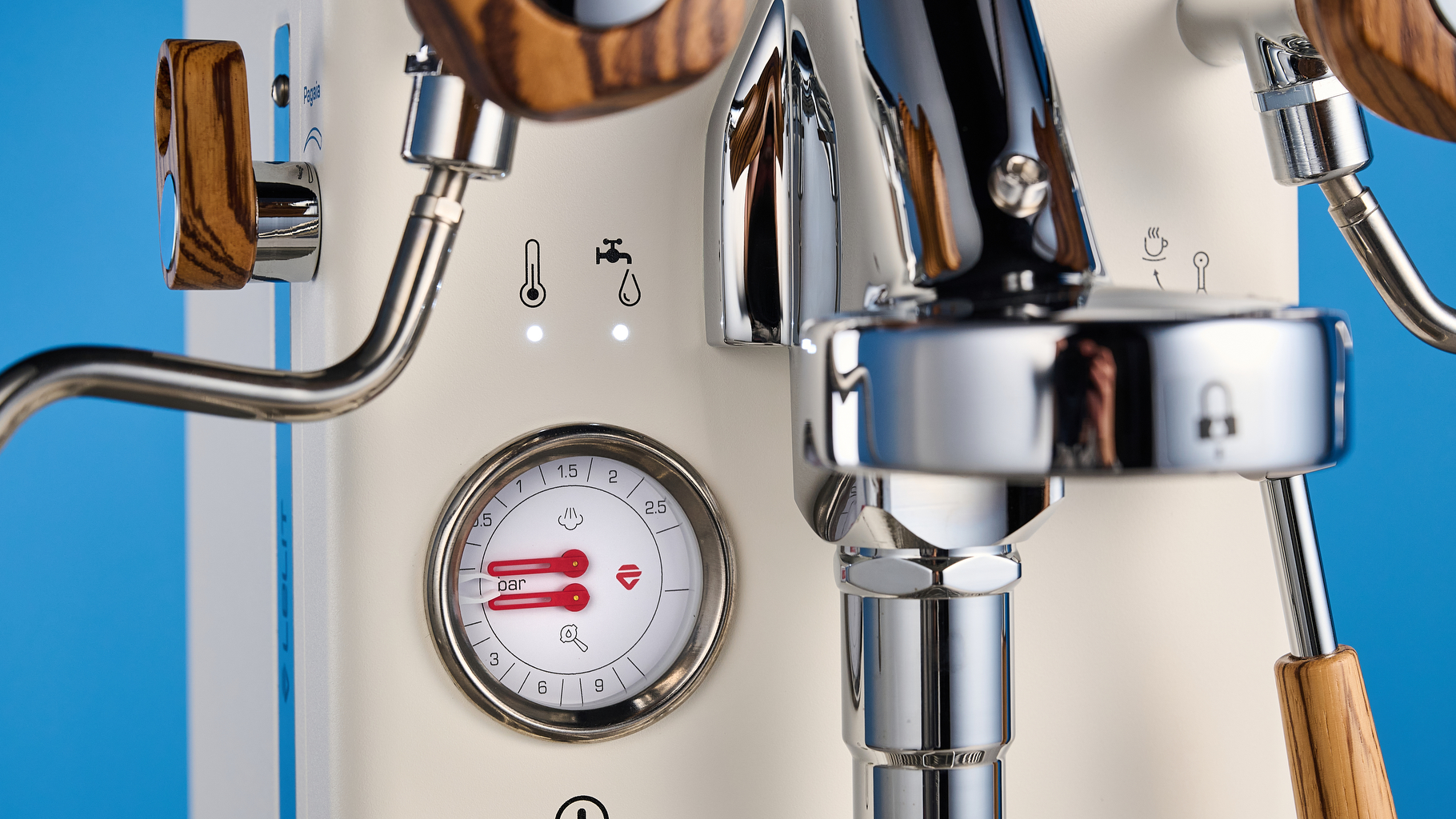 the lelit mara x3 in white and walnut photographed against a blue tom's guide background
