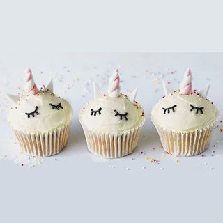 cupcake with white horn and white background