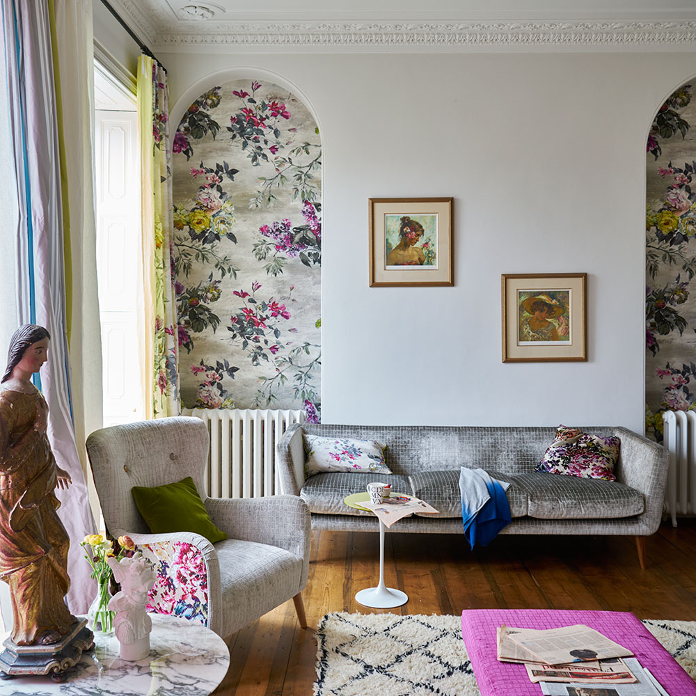 living room with white wall and armchair