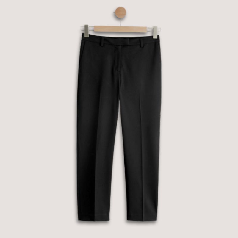 A pair of black slim fit trousers by Next