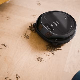Robot vacuum cleaner in a house