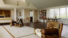A large open plan room with two cow print chairs