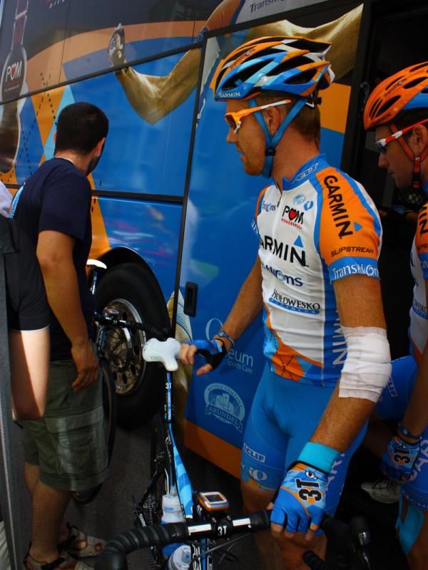 Tyler Farrar grabs his bike and heads to rider sign-in.