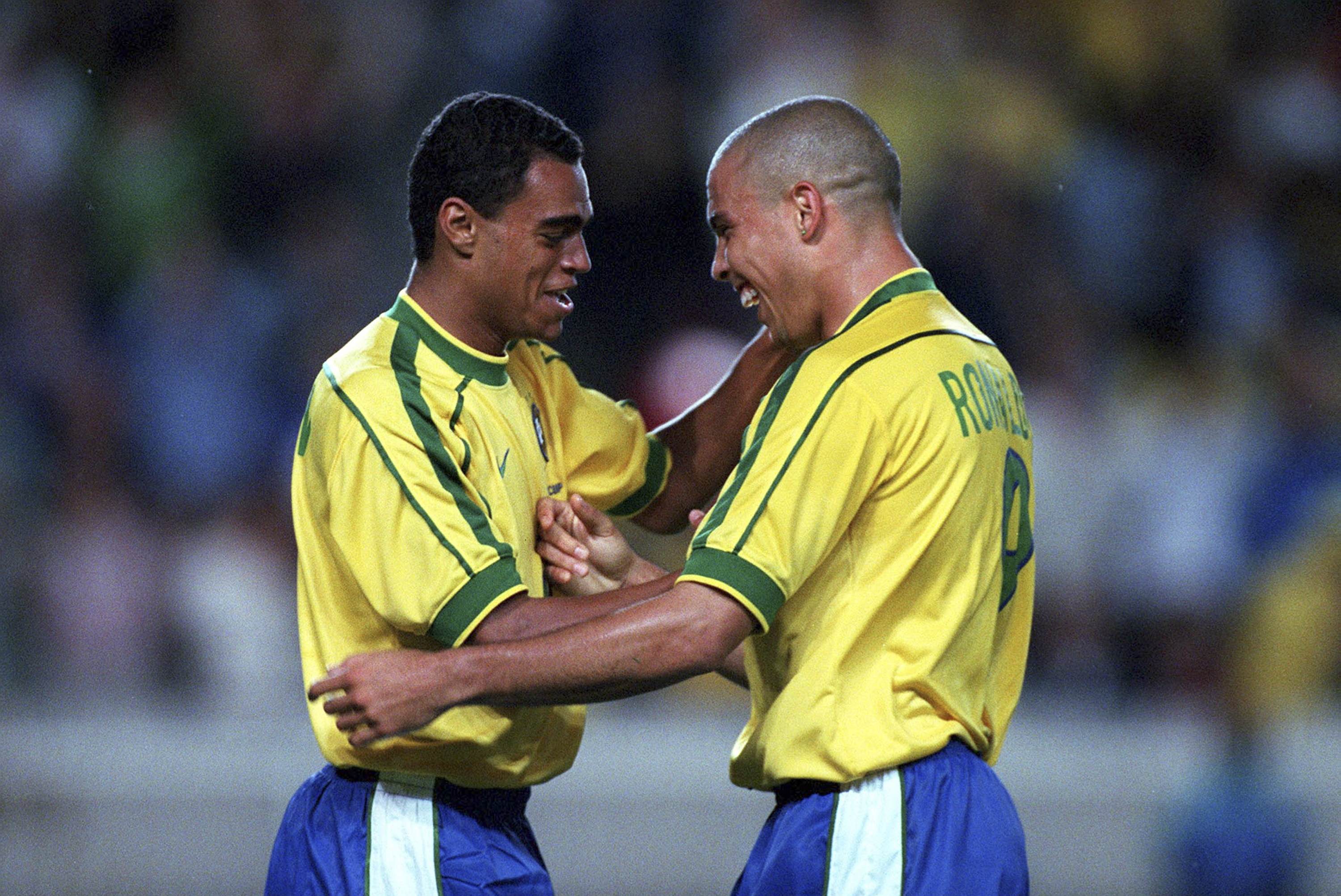 Denilson (L) alongside Ronaldo (R)