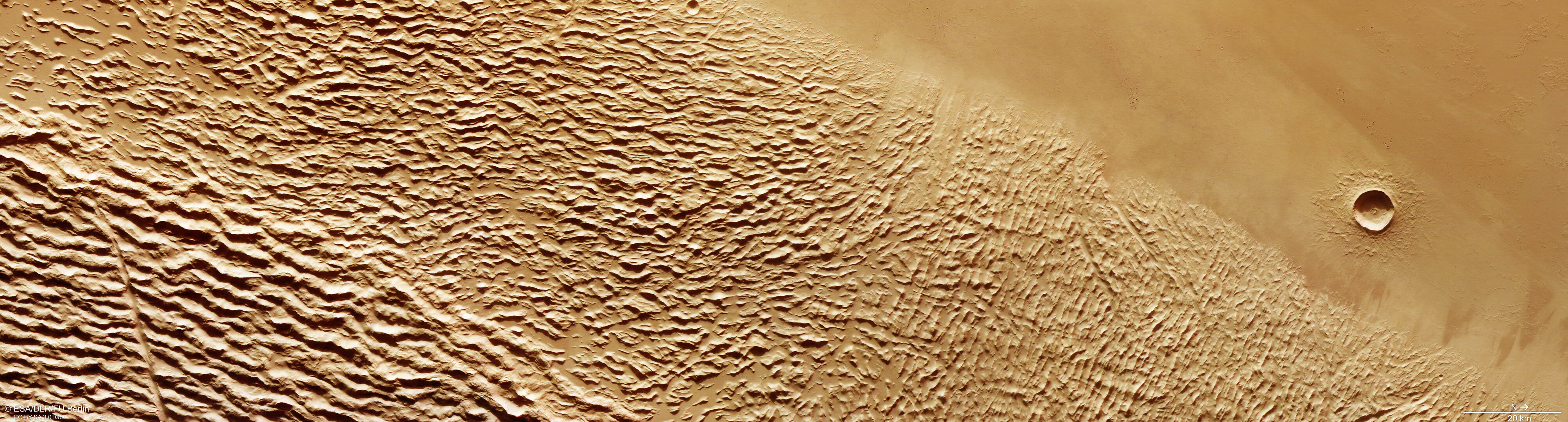 Lycus Sulci dan Kawah Yelwa di Mars seperti yang terlihat oleh pesawat luar angkasa Mars Express pada Januari 2023.