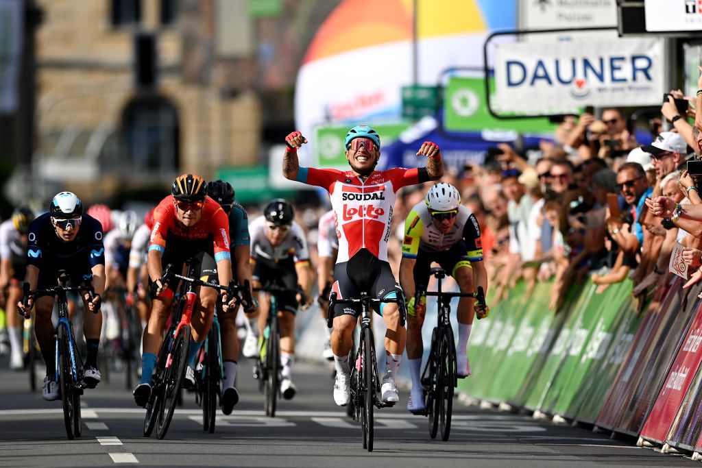 MEININGEN GERMANY AUGUST 25 Caleb Ewan of Australia and Team Lotto Soudal celebrates at finish line as stage winner ahead of Jonathan Milan of Italy and Team Bahrain Victorious Max Kanter of Germany and Movistar Team and Felix Gro of Germany and UAE Team Emirates during the 37th Deutschland Tour 2022 Stage 1 a 1717km stage from Weimar to Meiningen DeineTour on August 25 2022 in Meiningen Germany Photo by Stuart FranklinGetty Images