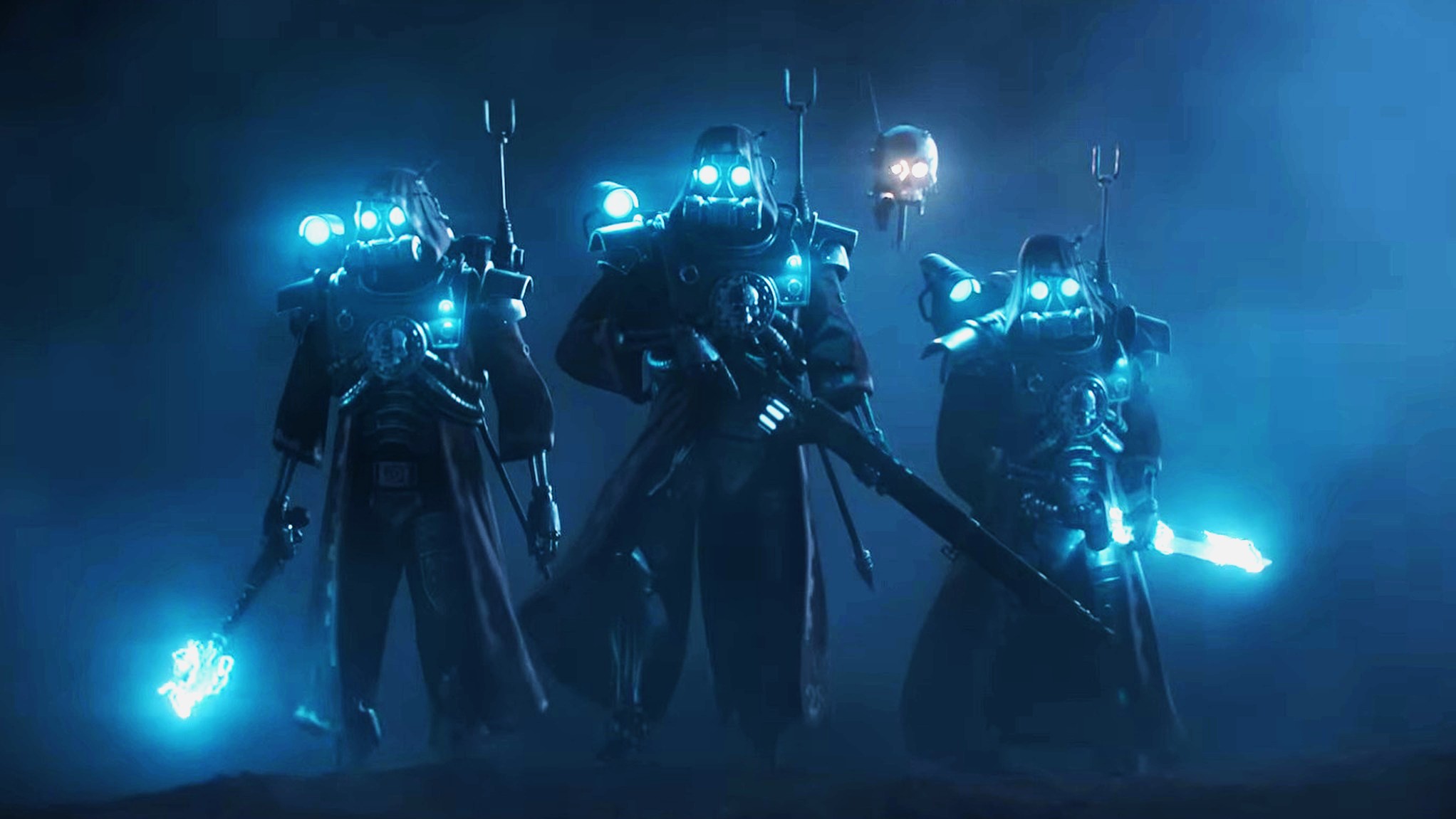 Four armored figures with glowing blue eyes and suits stand in dim blue light, exuding a futuristic and mysterious aura. They hold weapons, appearing ready for action.