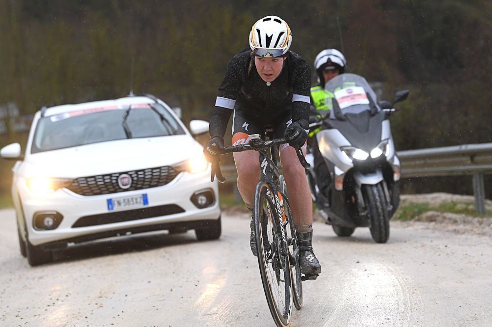 Anna van der Breggen attacks a gravel climb at Strade Bianche