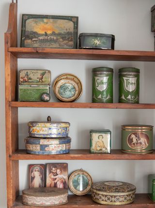 Display vintage tins on open shelving