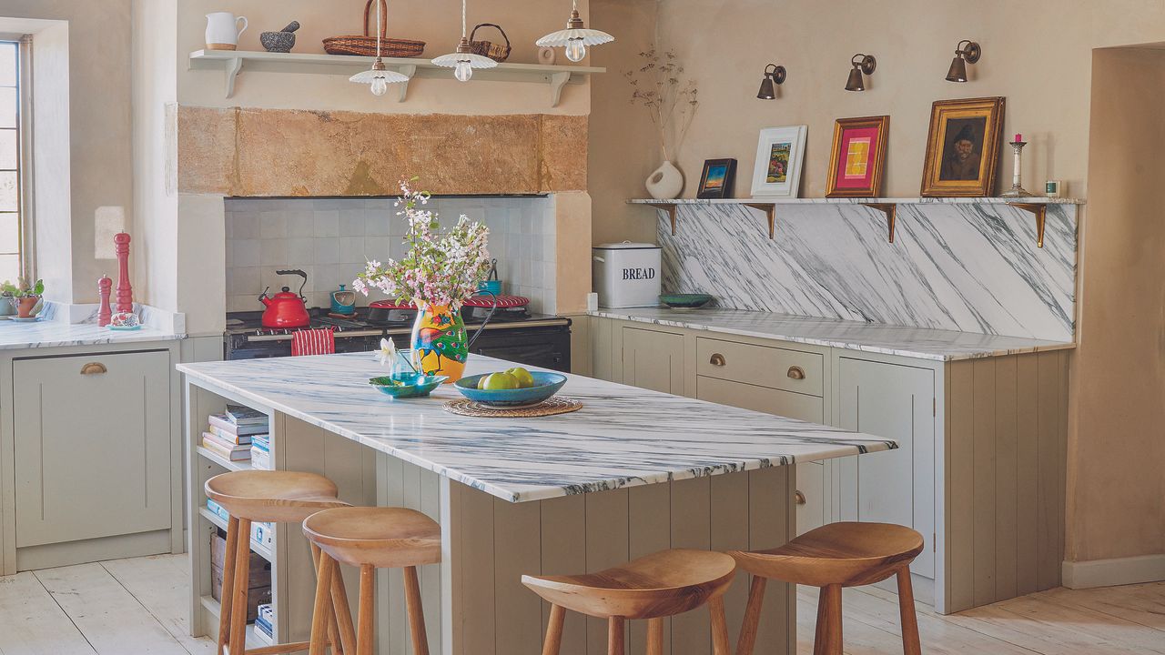 Sage green shaker kitchen with beige walls