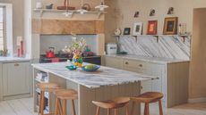 Sage green shaker kitchen with beige walls