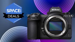 Nikon Z6 II mirrorless camera in black from a front-on view on the right side of the page with a Space.com logo on the left with some blue and purple circular patterns in the background