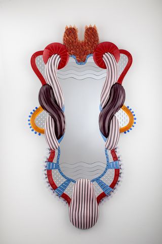 Mirror featuring sinuous colourful edges