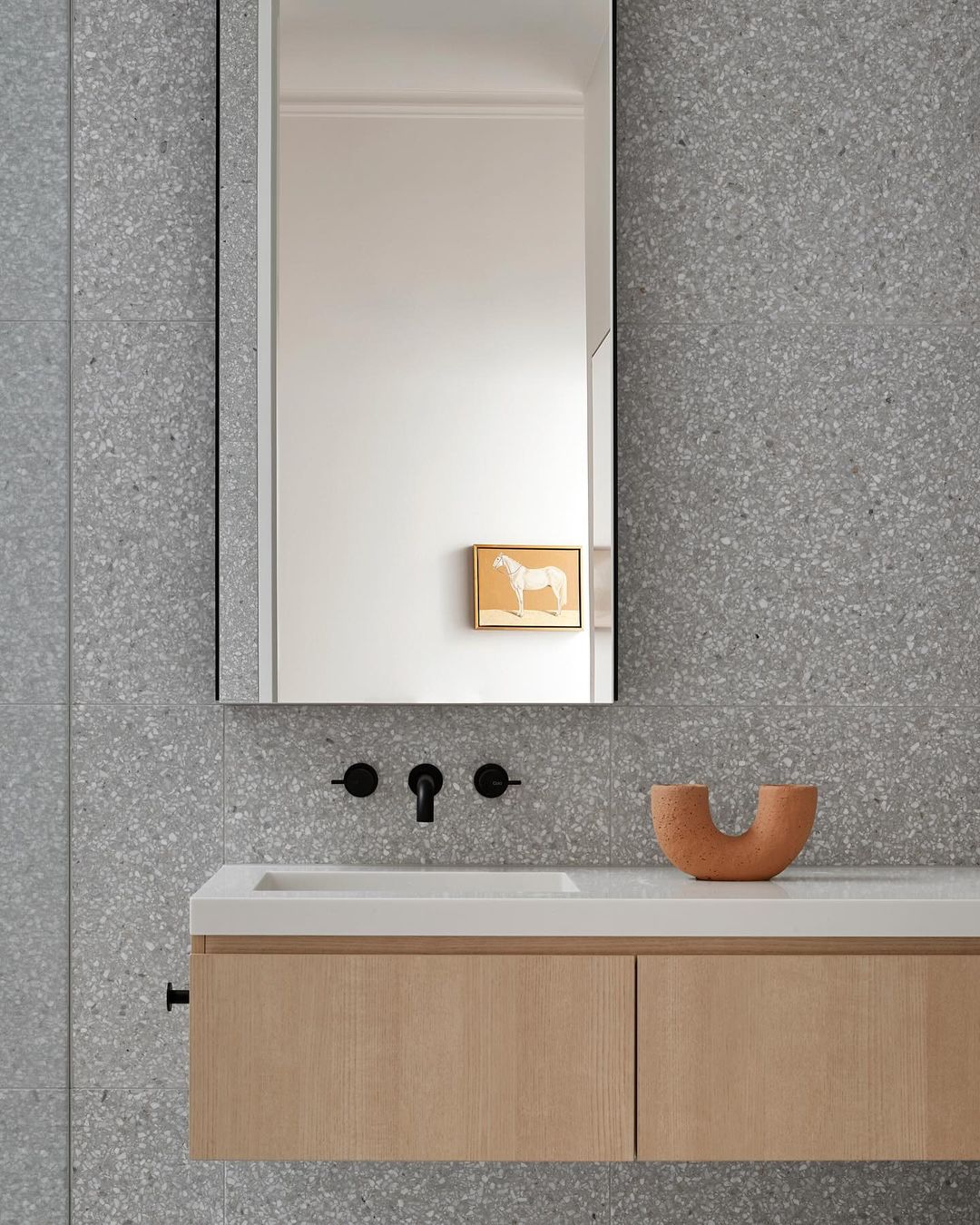 Gray terrazzo-style bathroom tile
