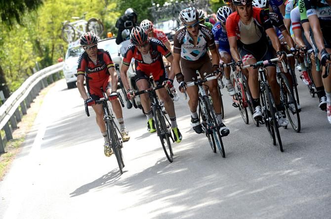BMC Racing's Cadel Evans is trying to limit his losses on the final climb of Stage 18