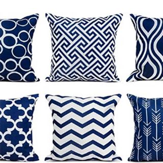 six blue decorative throw pillows