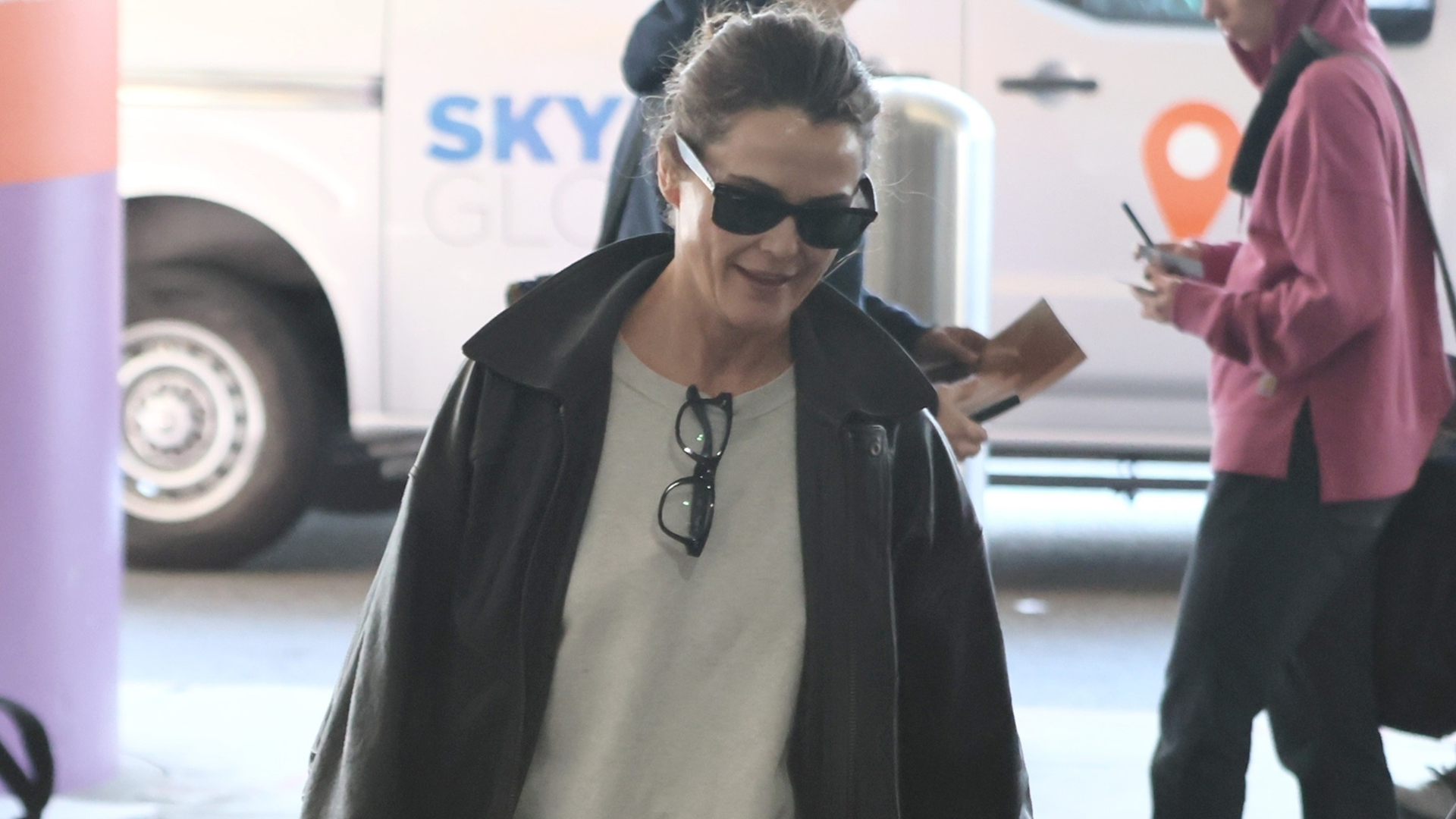 Keri Russell at the airport after the 2026 Golden Globes wearing chunky New Balance sneakers