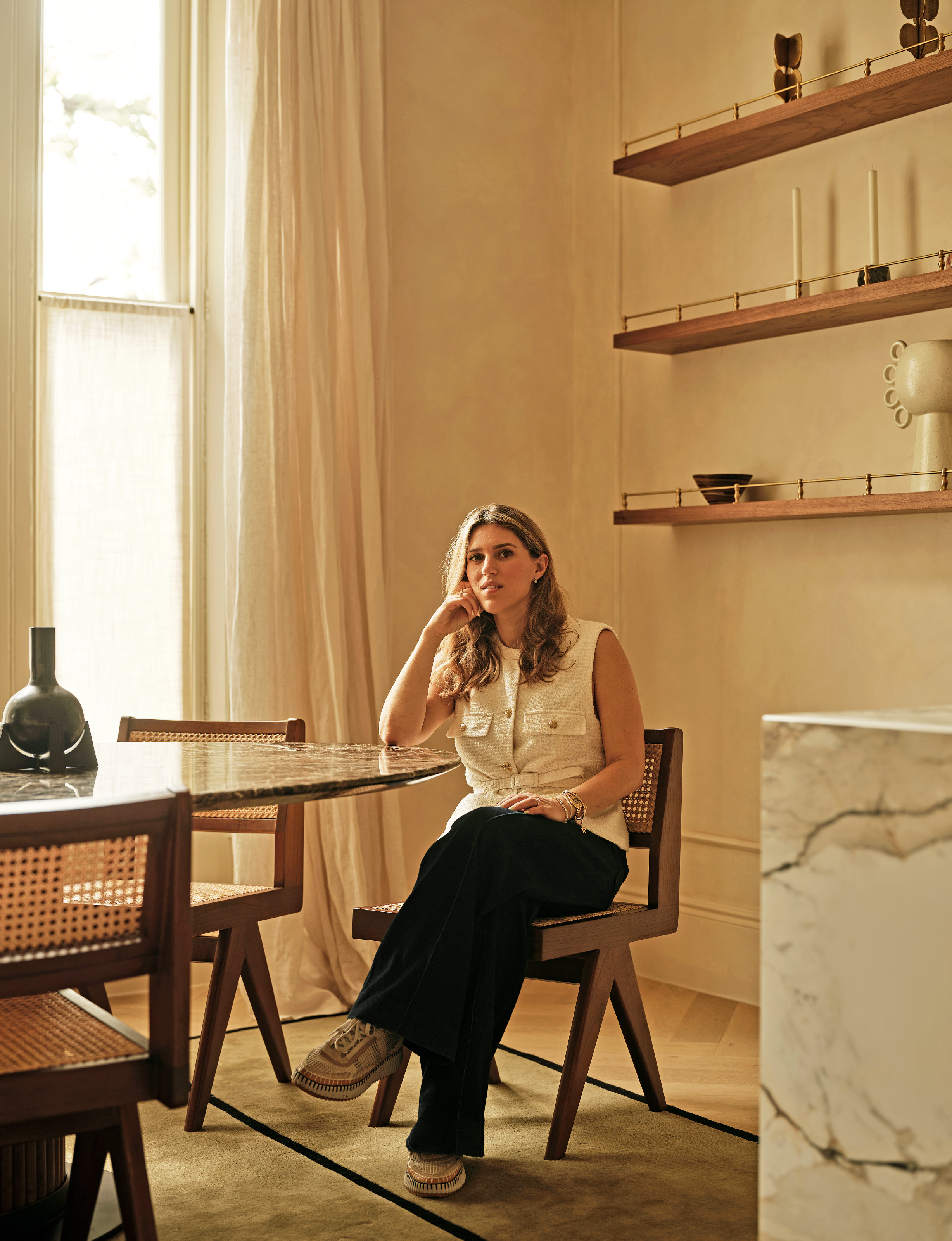 Lucy Goldbart sitting at a dining room table