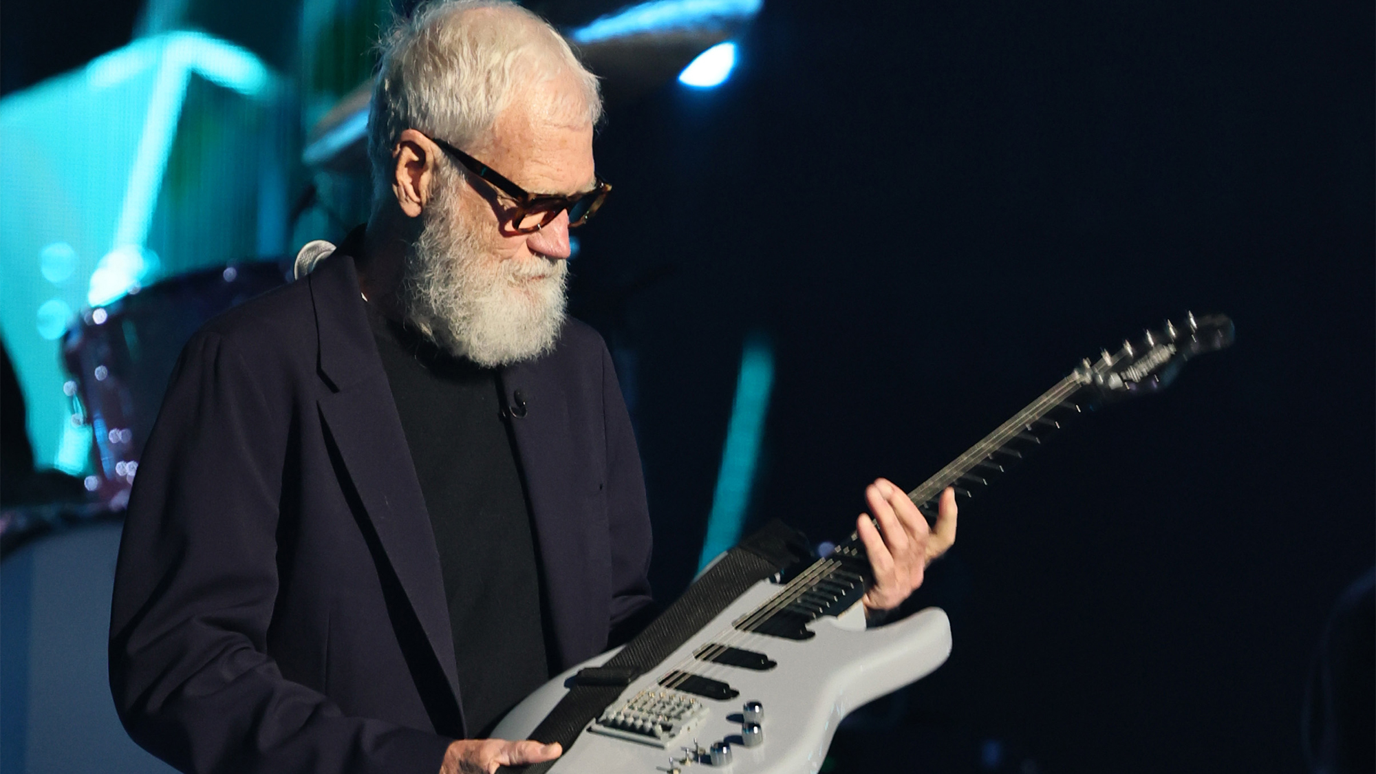 David Letterman speaks onstage during the 2025 Rock &amp;amp; Roll Hall Of Fame Induction Ceremony for Warren Zevon, inside at Peacock Theater on November 08, 2025 in Los Angeles, California. He is holding the all-gray Modulus Blackknife model Zevon gifted him in 2002.