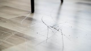 A hardwood floor with light scratches