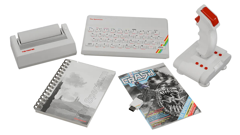 Product shot of new white ZX Spectrum replica with classic Spectrum joystick and other accessories